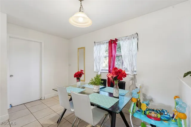 a view of a dining room with furniture and toys
