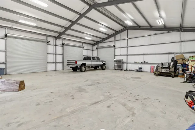 a outdoor space with lots of tables and chairs