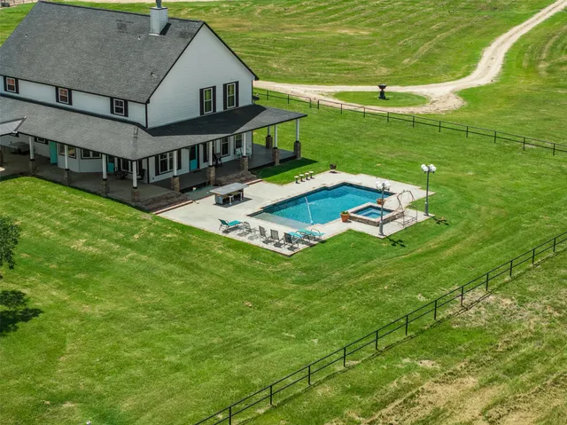 a view of a house with a big yard