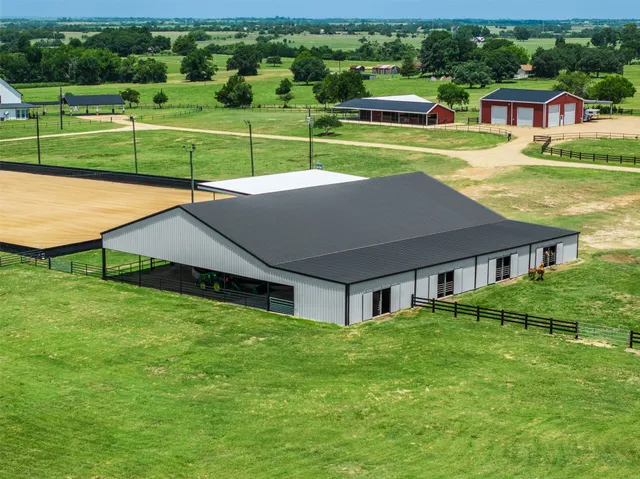a view of a house with a big yard
