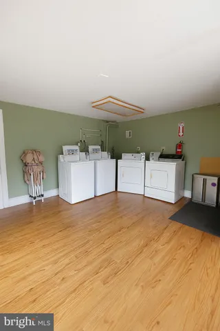 a bedroom with a bed and a chair