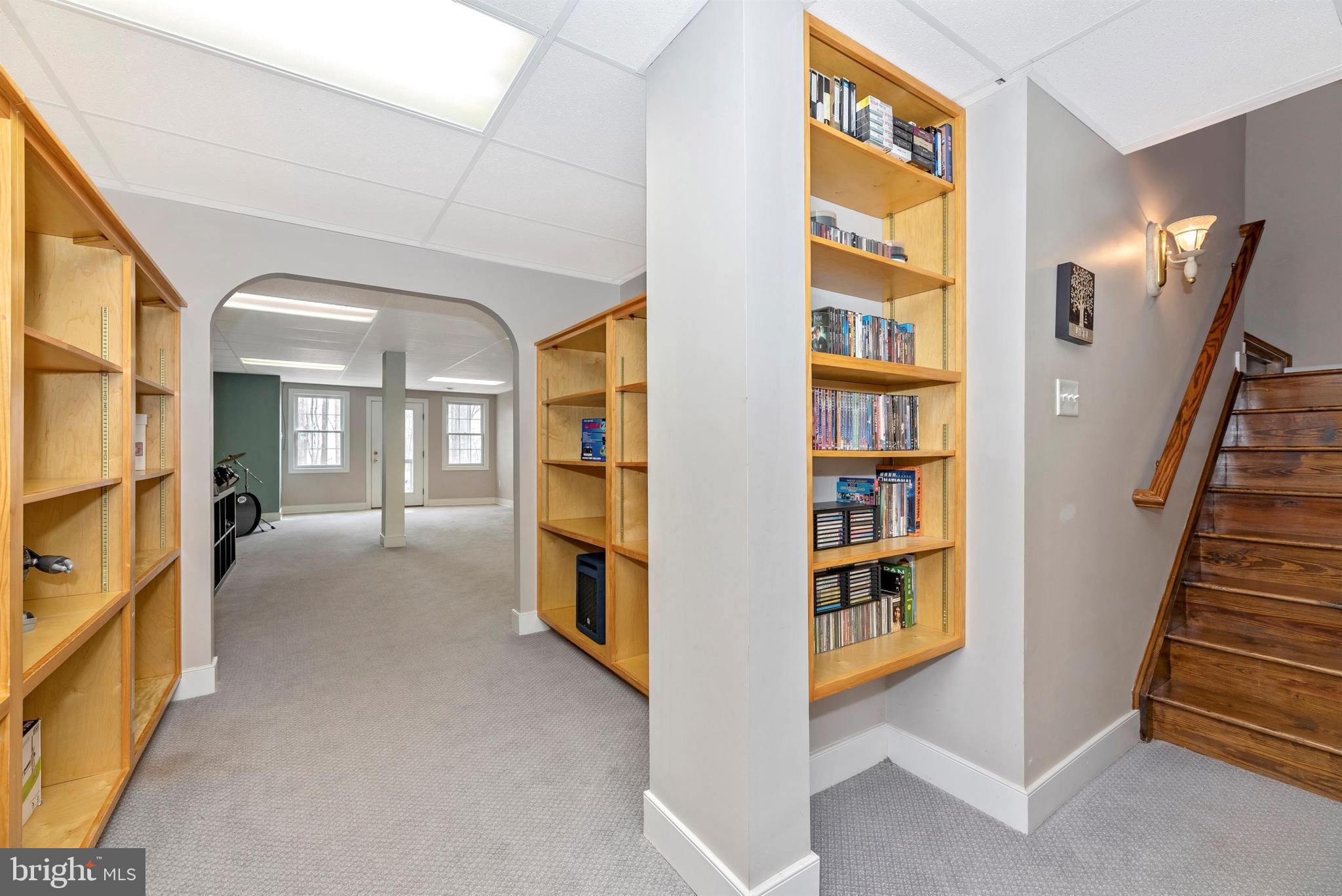 4340 Basford Road Frederick, MD 21703 - Photo 45 of 58 Lower Level Built-In Shelving for Games or Books