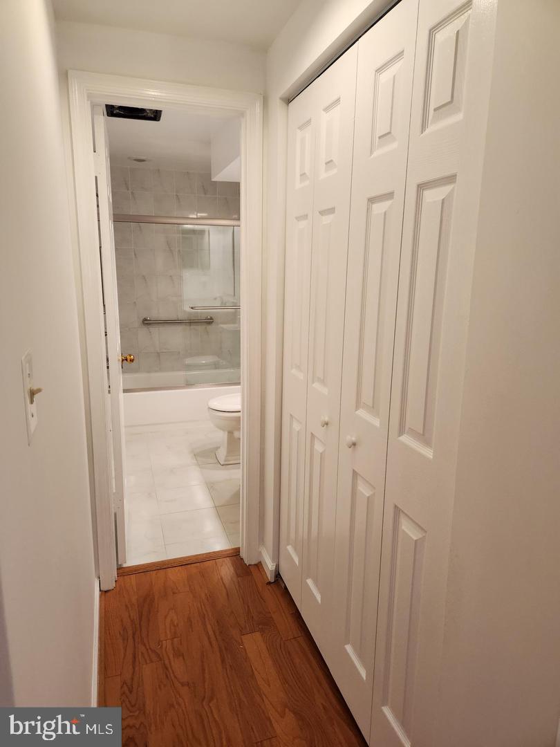 2725 Connecticut Avenue Northwest, Unit 406 Washington, DC 20008 - Photo 16 of 24 a view of entryway with wooden floor