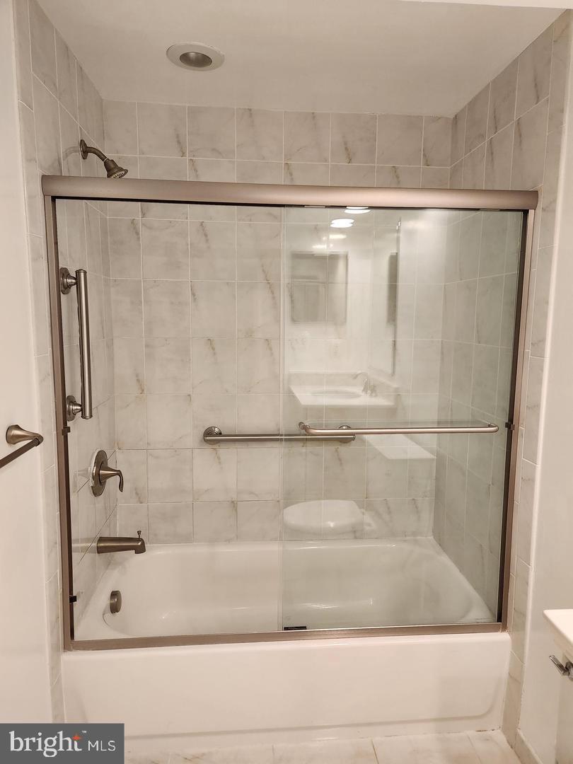 2725 Connecticut Avenue Northwest, Unit 406 Washington, DC 20008 - Photo 19 of 24 a bathroom with a shower