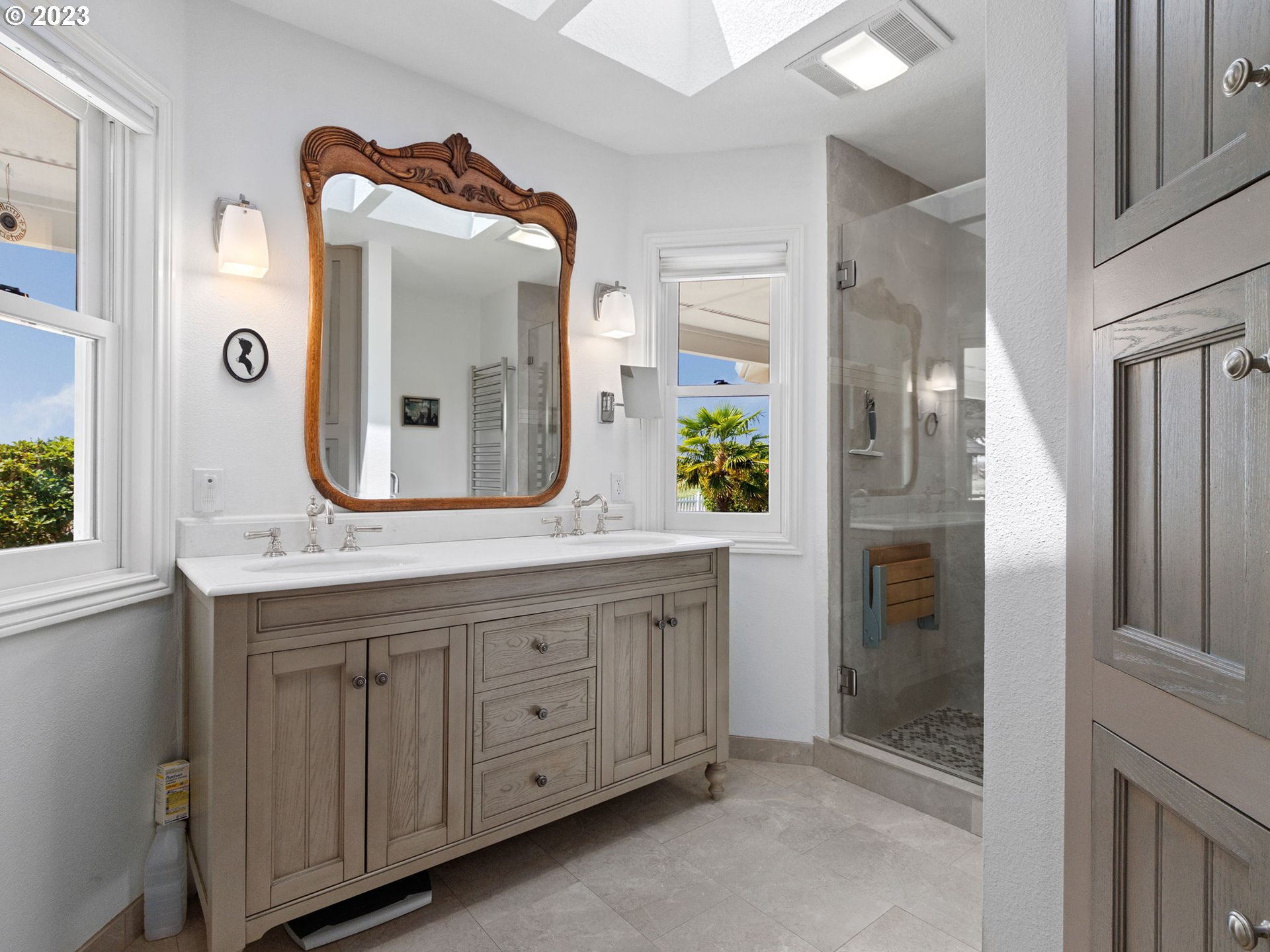 29600 South Dryland Road Canby, OR 97013 - Photo 21 of 48 a bathroom with a granite countertop sink and a mirror