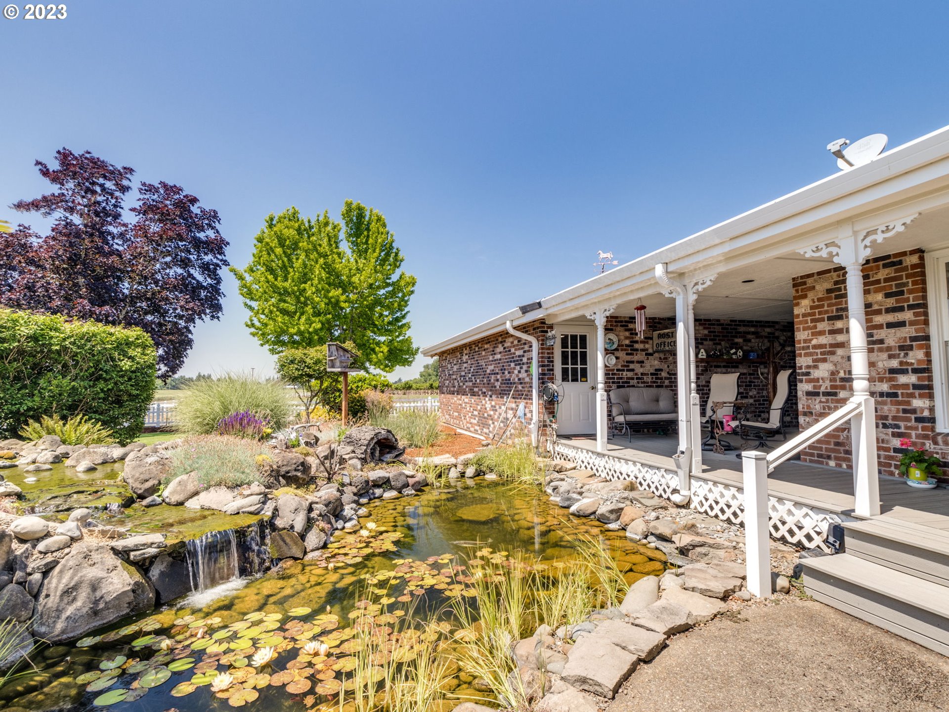 29600 South Dryland Road Canby, OR 97013 - Photo 30 of 48 a view of a house with a patio