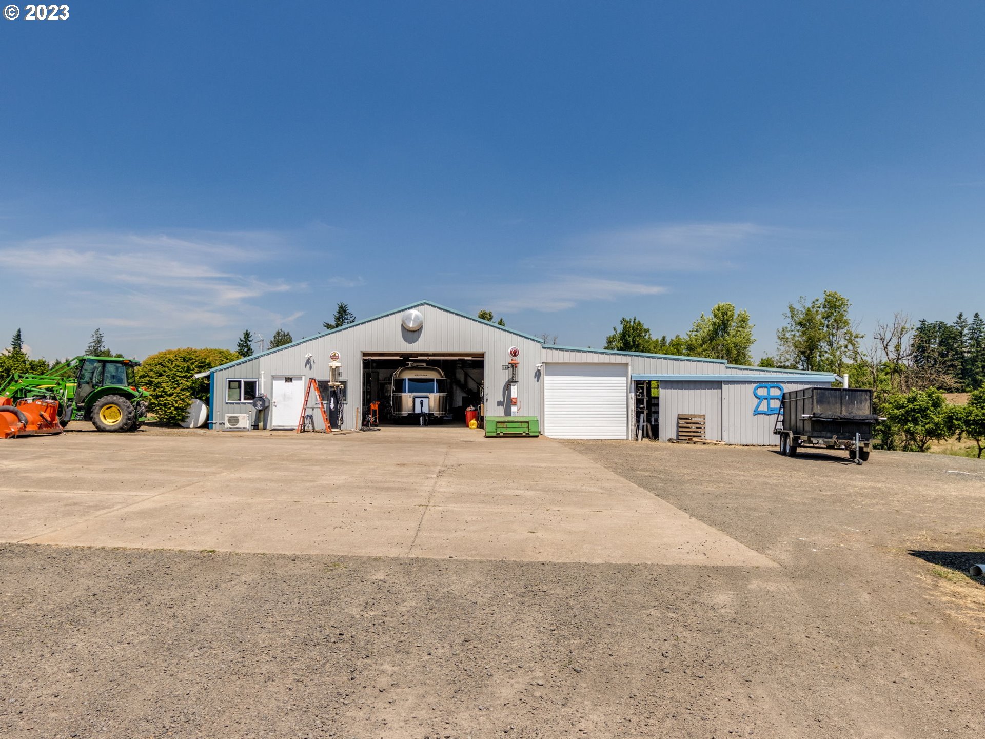 29600 South Dryland Road Canby, OR 97013 - Photo 41 of 48 a front view of a house with a yard and garage