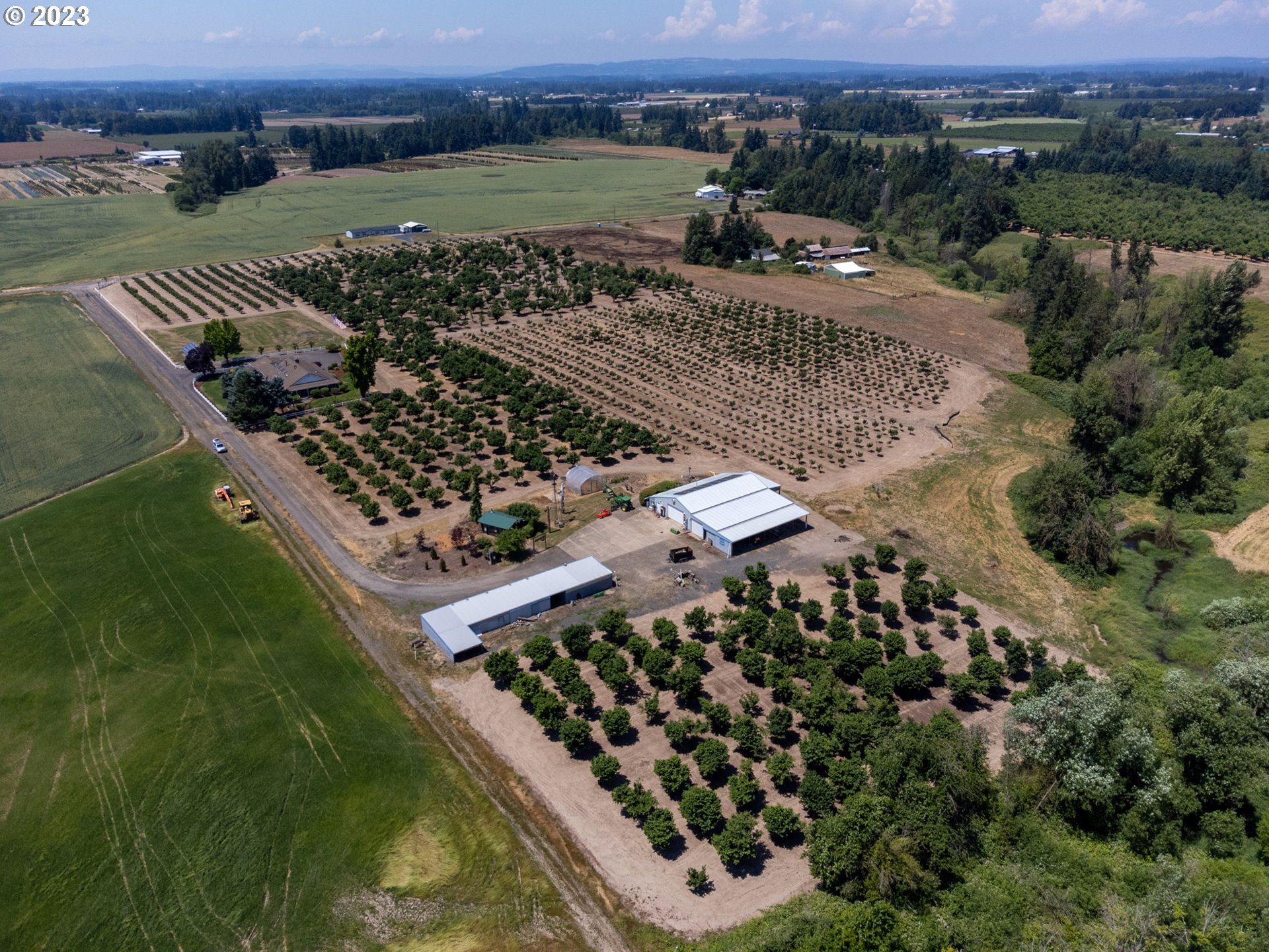 29600 South Dryland Road Canby, OR 97013 - Photo 45 of 48 an aerial view of a residential houses with outdoor space and trees