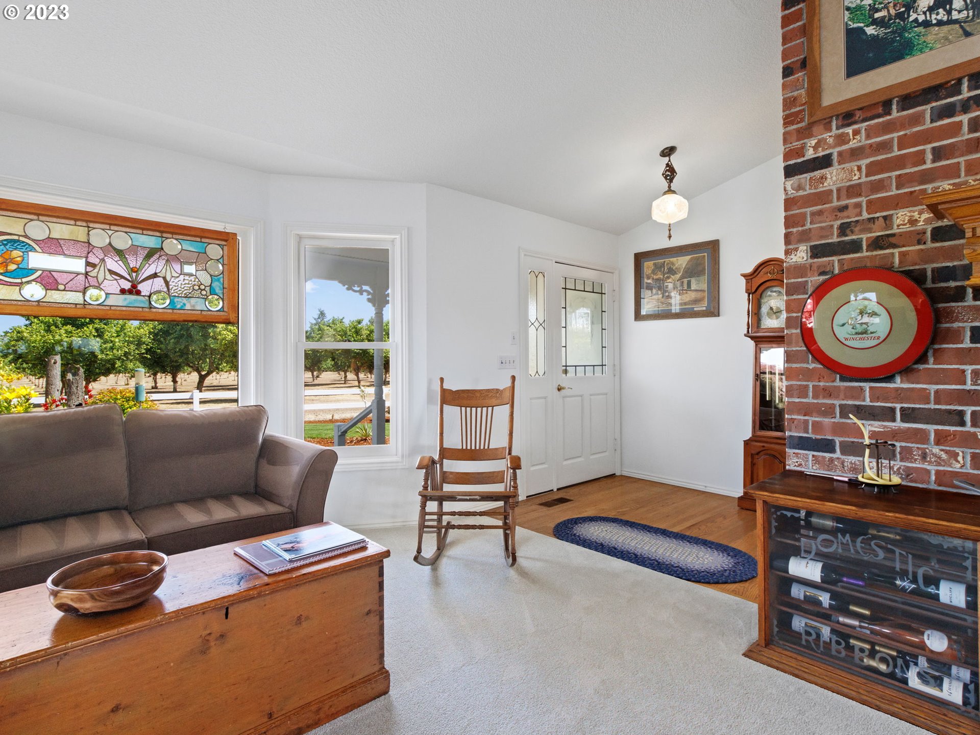29600 South Dryland Road Canby, OR 97013 - Photo 10 of 48 a living room with furniture a rug and a window