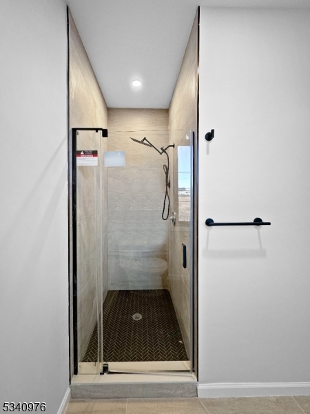 445 Grove Street, Unit 2 Irvington, NJ 07111 - Photo 6 of 11 a bathroom with a shower