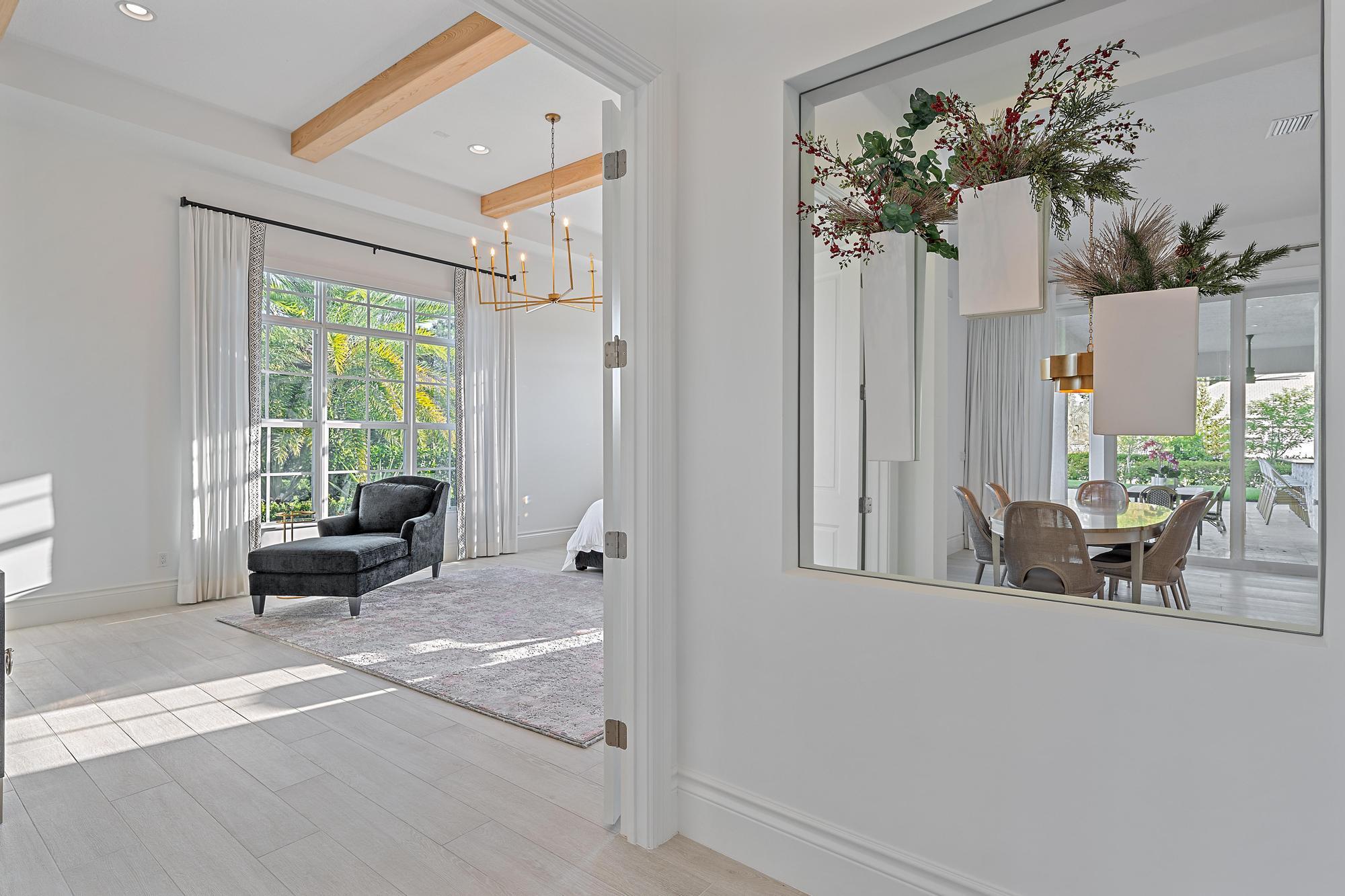 10096 Calabrese Trail Jupiter, FL 33478 - Photo 31 of 58 a living room with furniture and a large window