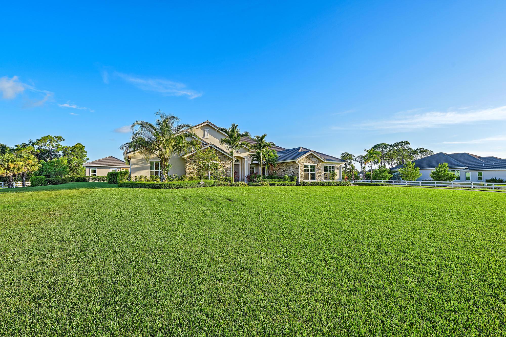 10096 Calabrese Trail Jupiter, FL 33478 - Photo 54 of 58 a view of a green field