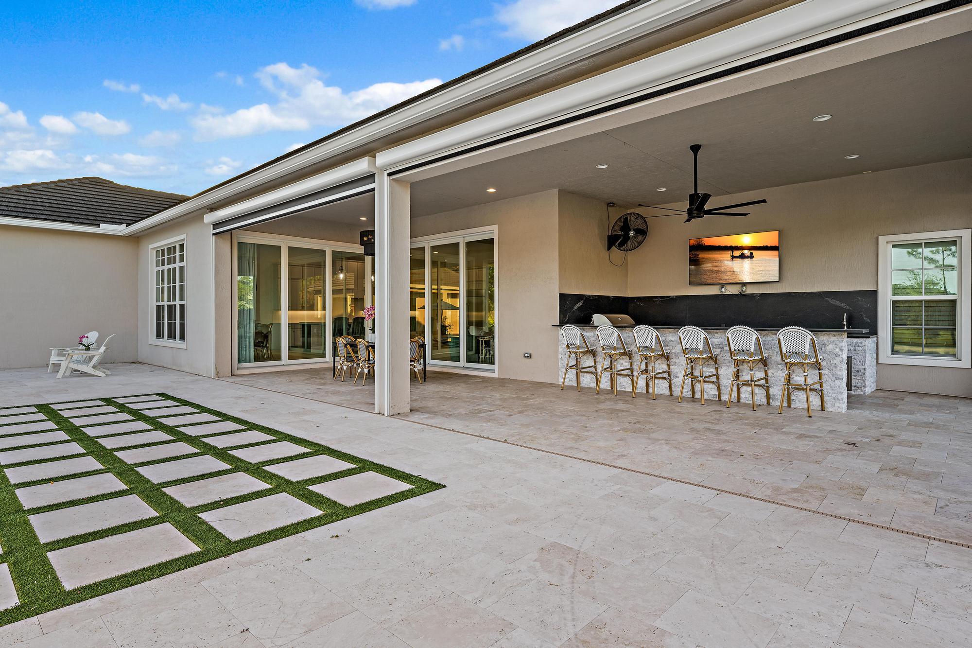10096 Calabrese Trail Jupiter, FL 33478 - Photo 10 of 58 a view of a livingroom with furniture