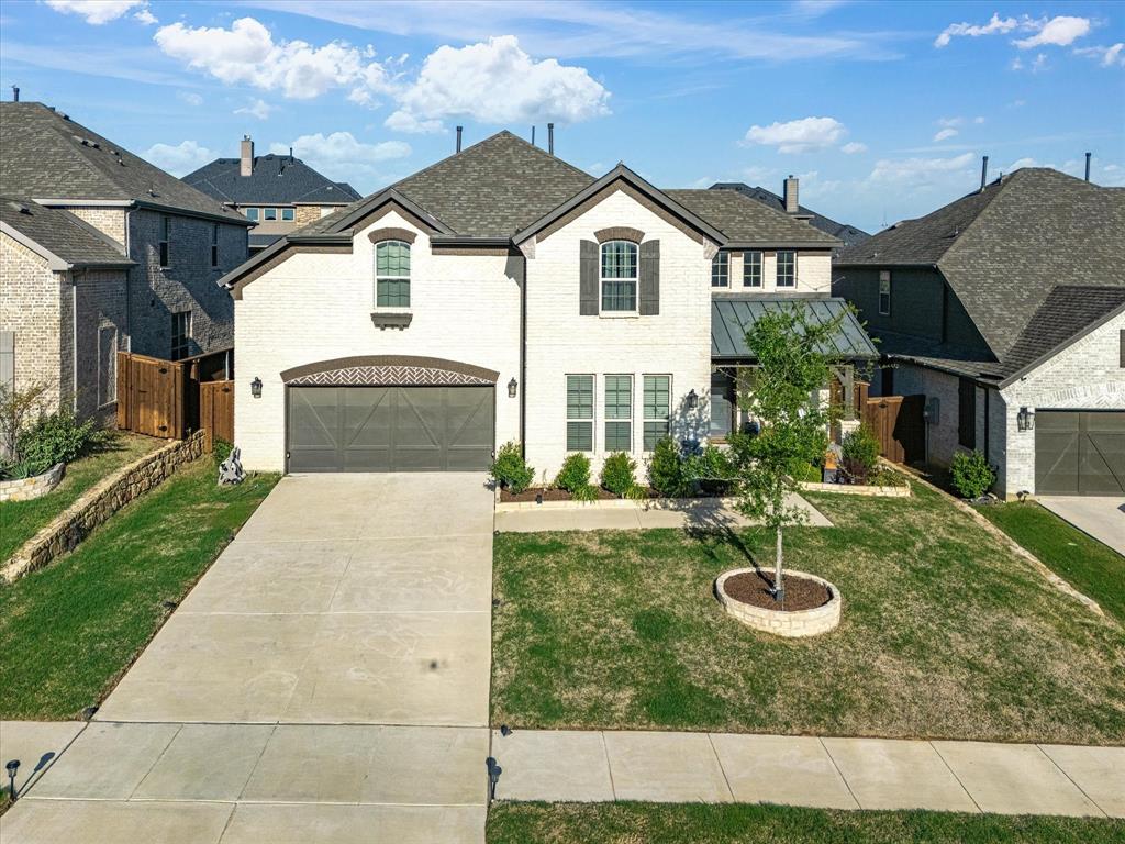 1606 Evening Primrose Drive Mansfield, TX 76063 - Photo 1 of 36 a front view of a house with yard