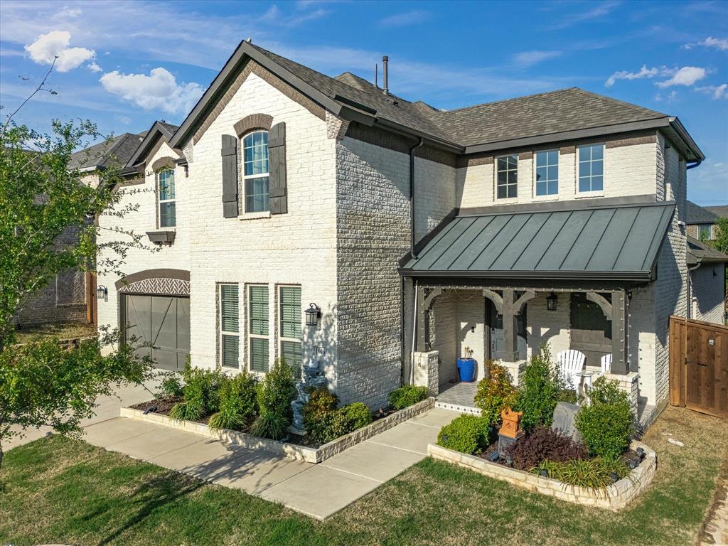1606 Evening Primrose Drive Mansfield, TX 76063 - Photo 2 of 36 a front view of a house with garden