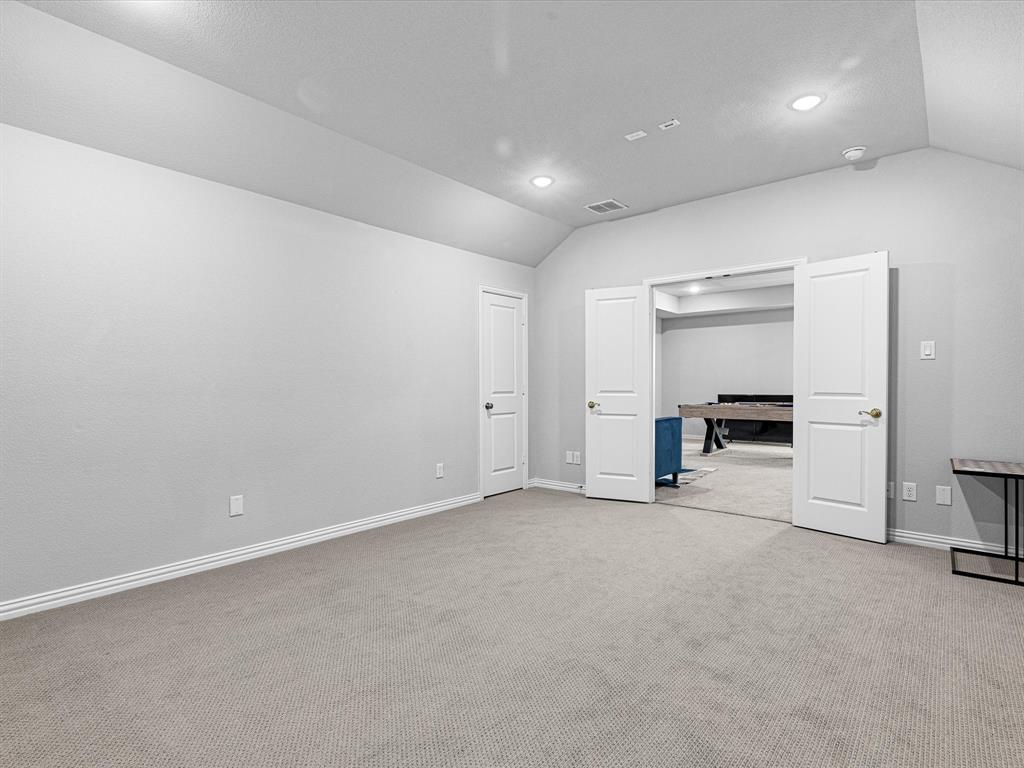1606 Evening Primrose Drive Mansfield, TX 76063 - Photo 28 of 36 an empty room with a bathroom