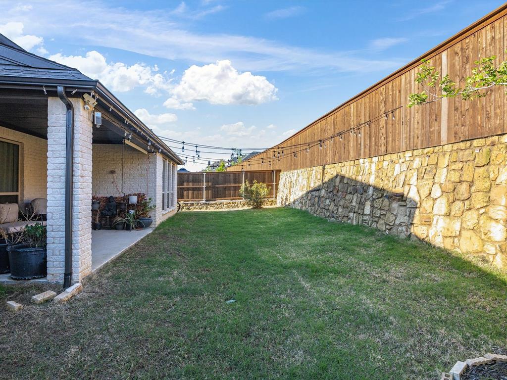 1606 Evening Primrose Drive Mansfield, TX 76063 - Photo 36 of 36 a view of outdoor space and yard