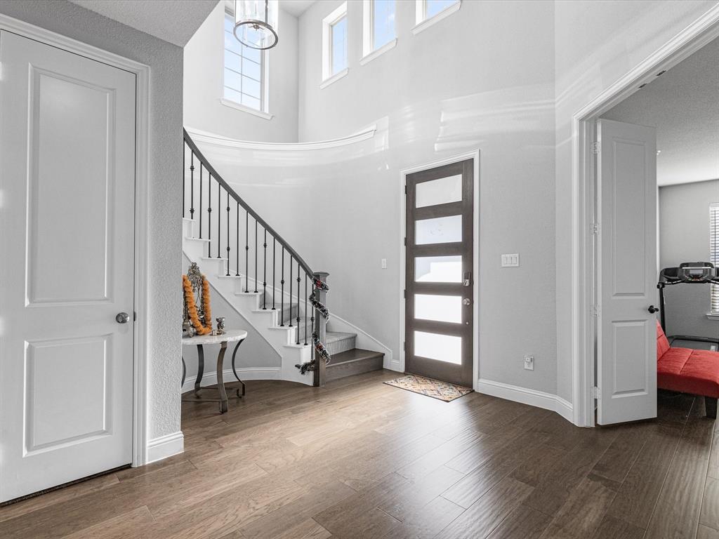1606 Evening Primrose Drive Mansfield, TX 76063 - Photo 5 of 36 a view of an entryway with wooden floor