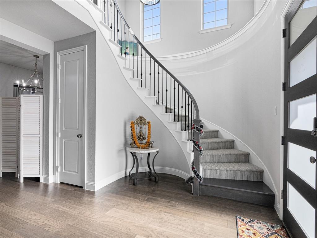 1606 Evening Primrose Drive Mansfield, TX 76063 - Photo 6 of 36 a view of entryway and hall with wooden floor