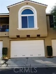 a front view of a house with yard