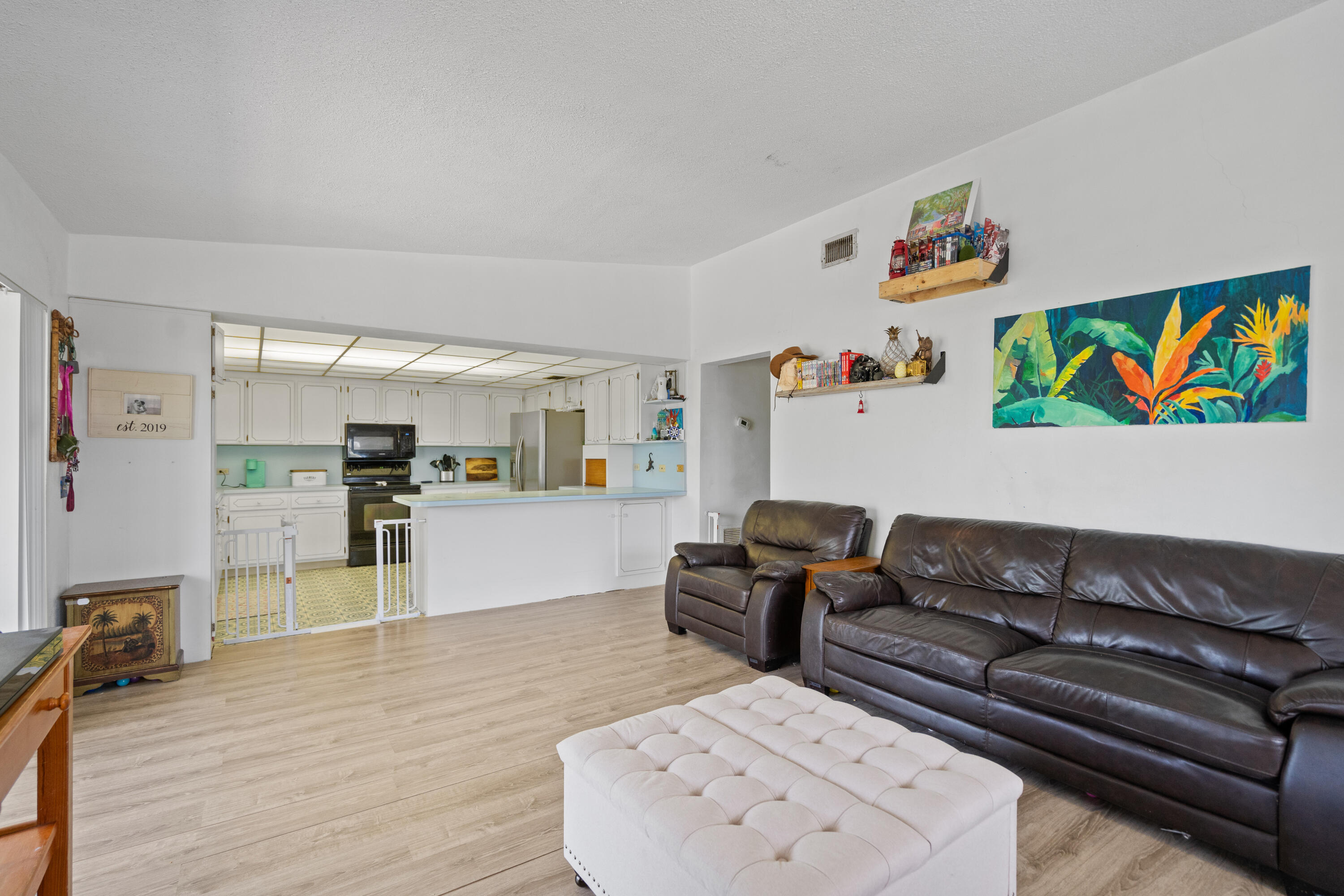778 Canal Street Key Largo, FL 33037 - Photo 16 of 34 a living room with furniture and a kitchen view