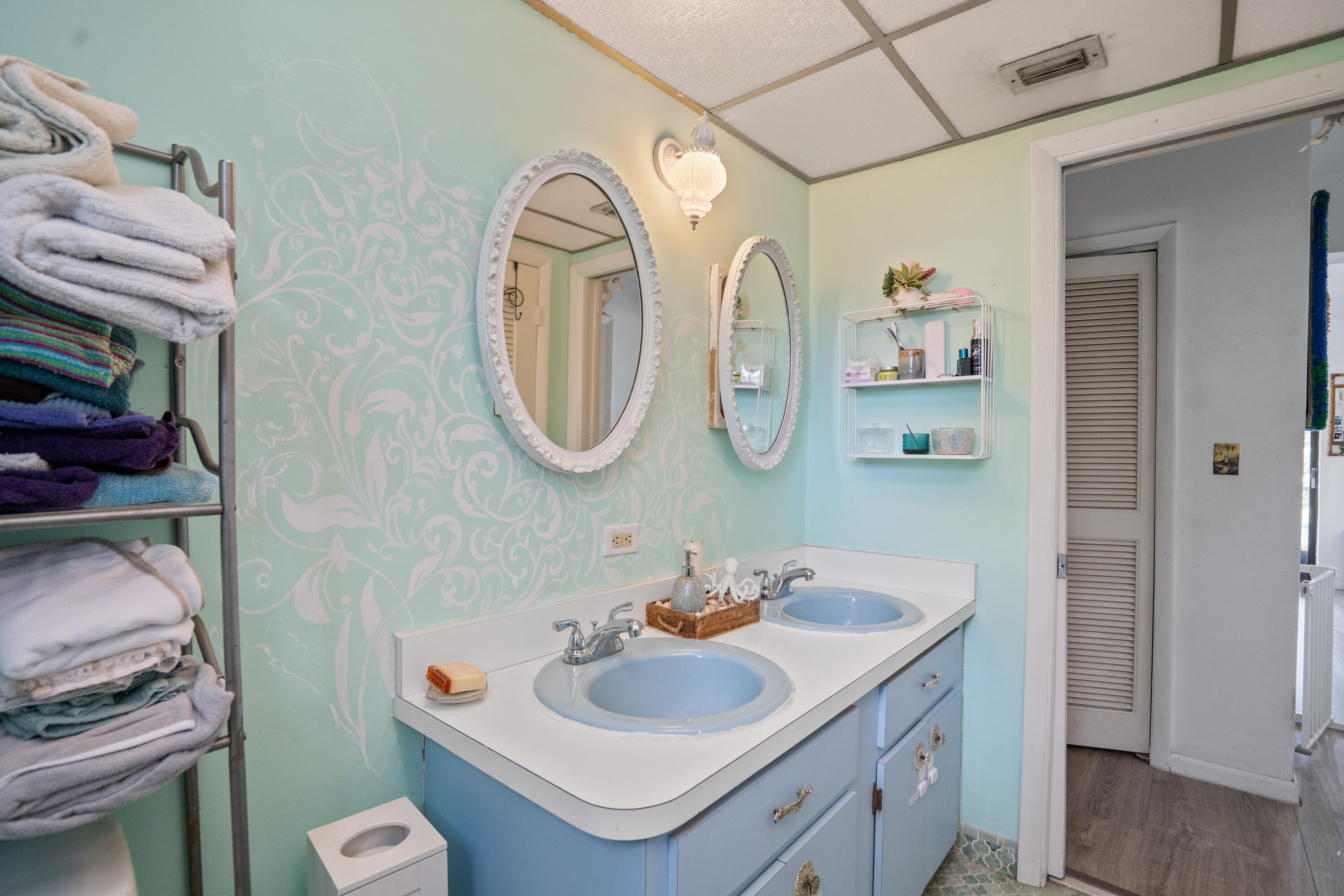 778 Canal Street Key Largo, FL 33037 - Photo 24 of 34 a bathroom with a sink and a mirror