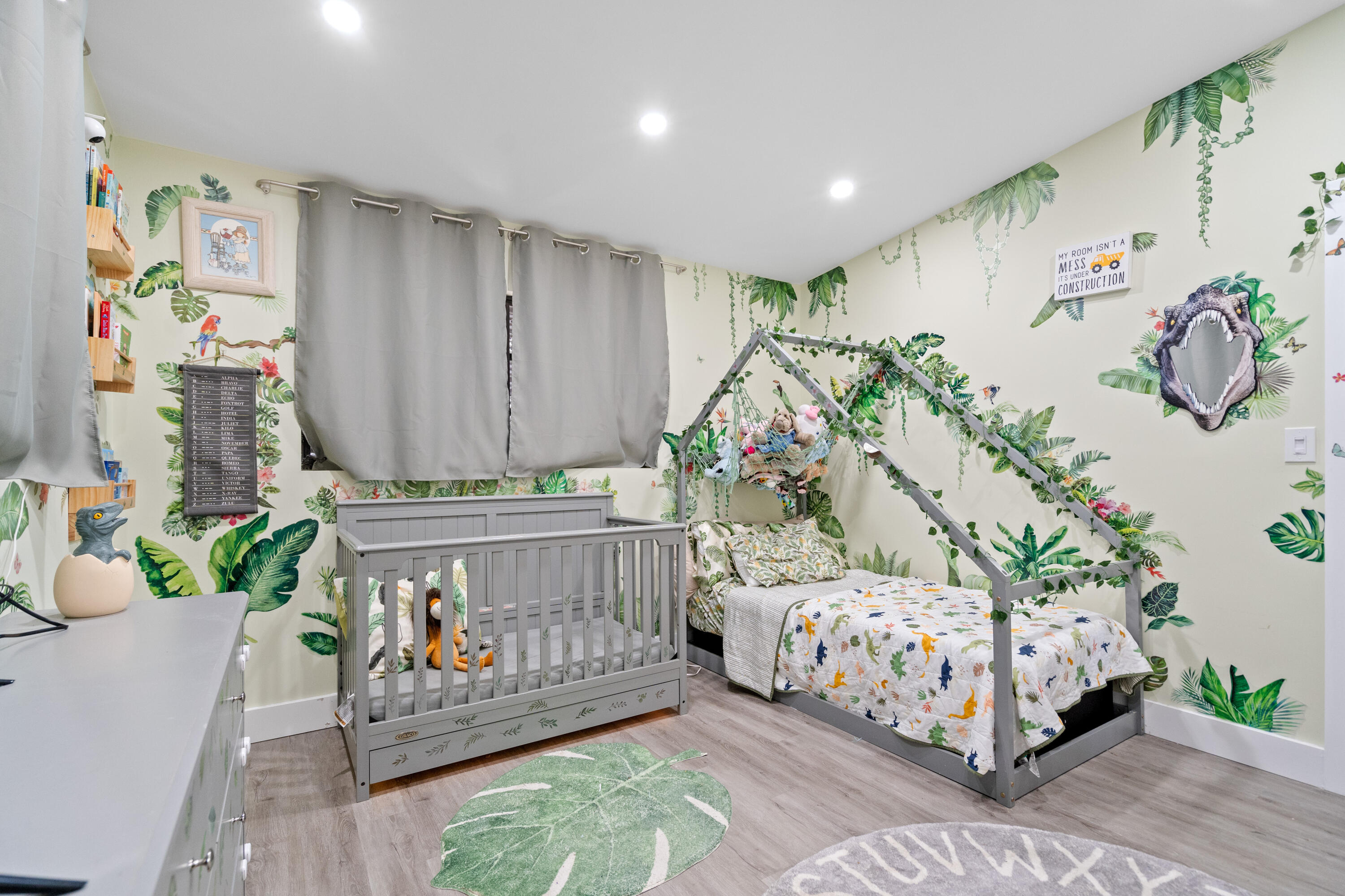 778 Canal Street Key Largo, FL 33037 - Photo 26 of 34 a bedroom with furniture and a painting on the wall