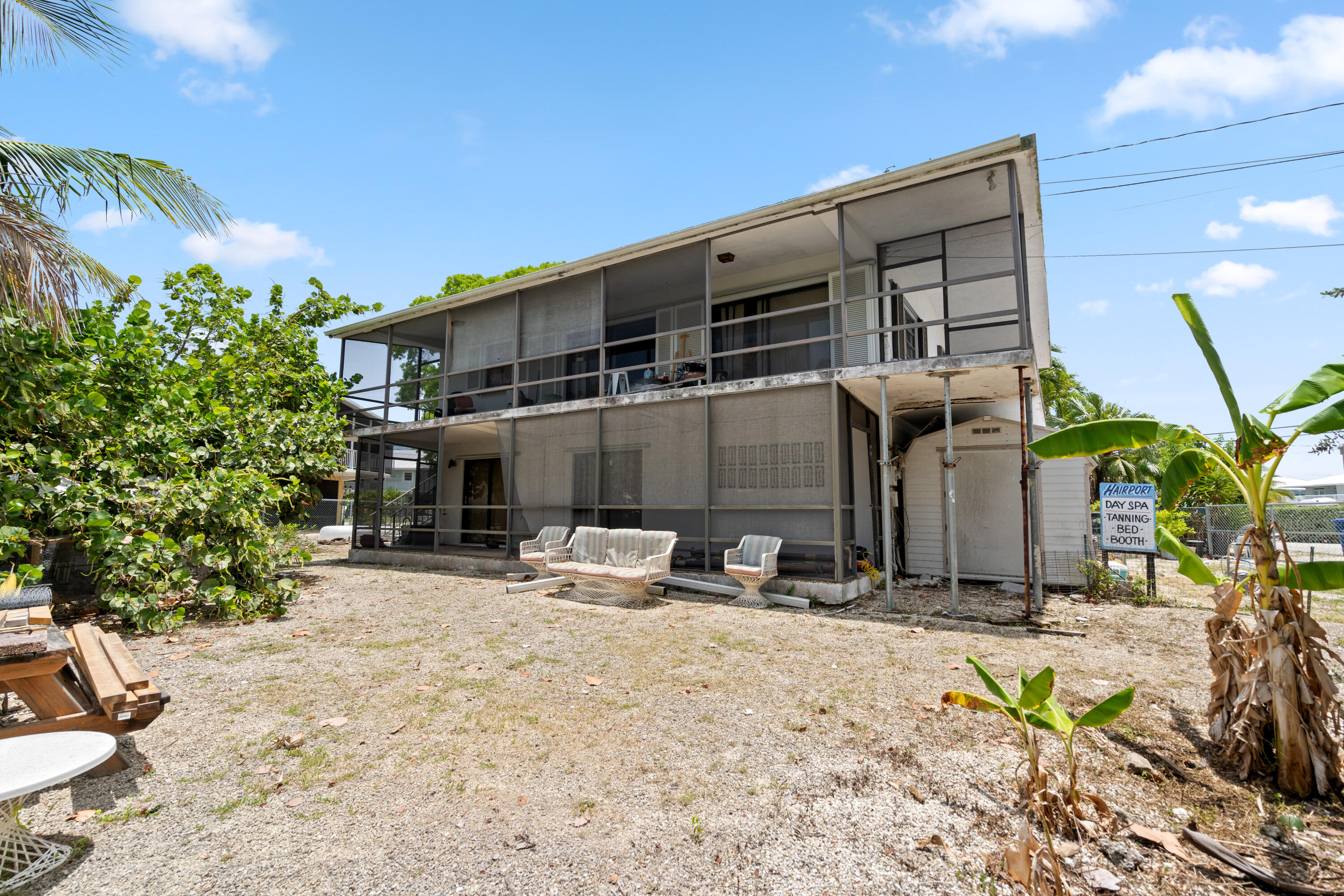 778 Canal Street Key Largo, FL 33037 - Photo 6 of 34 a front view of a house with sitting area