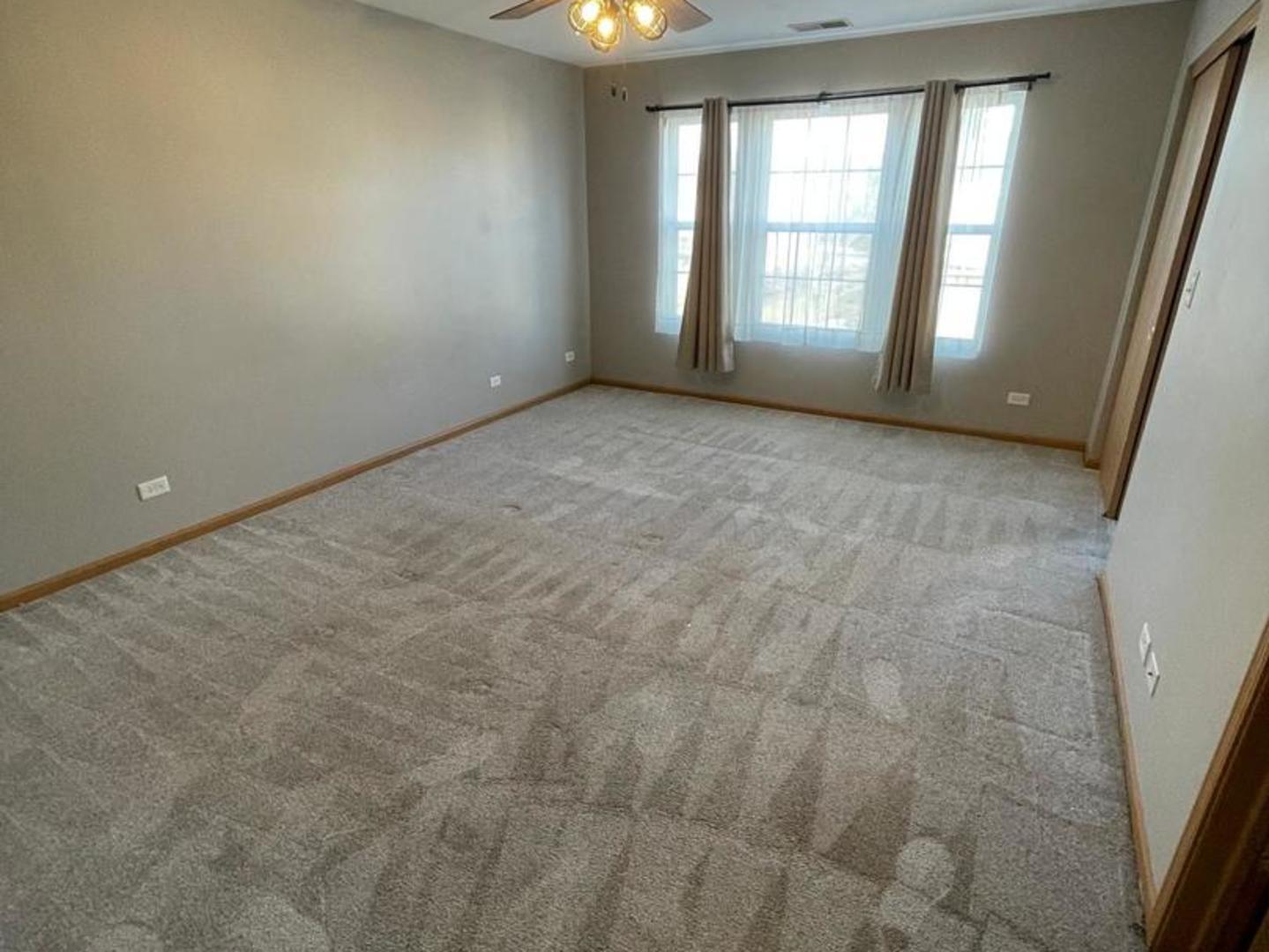 458 Landmark Avenue, Unit 458 Yorkville, IL 60560 - Photo 13 of 19 a view of room with window and pillar in it