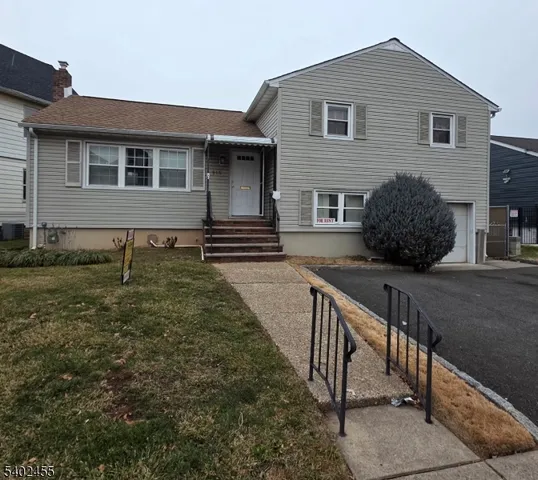 a front view of house with yard