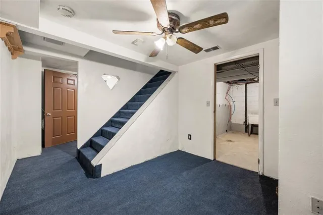 a view of an entryway with stairs