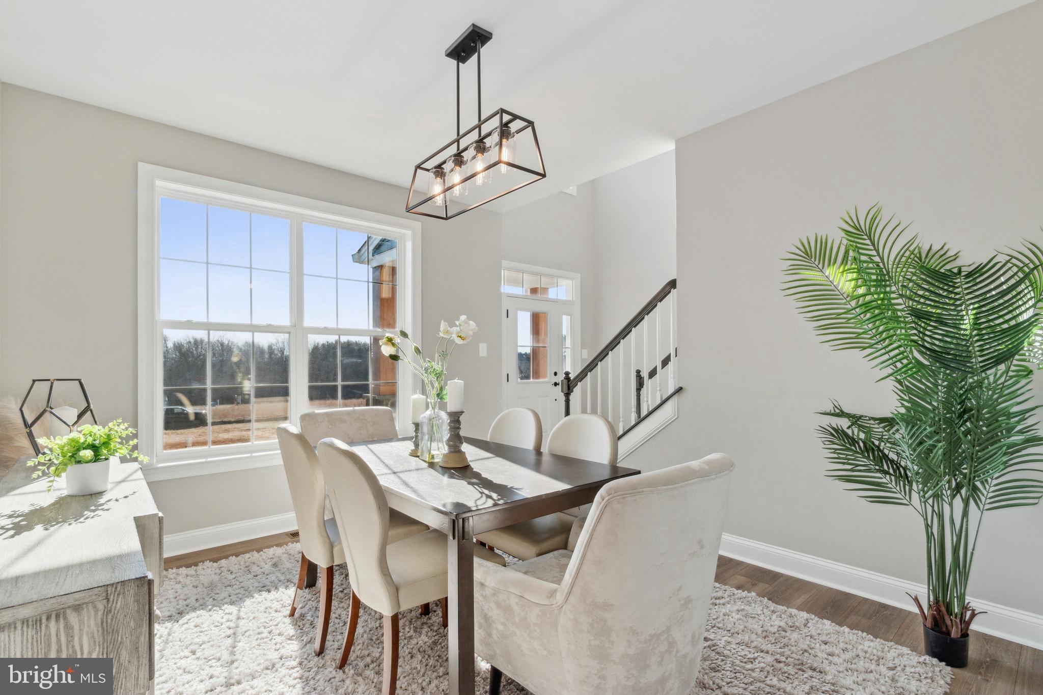 2204 Arden Drive Fallston, MD 21047 - Photo 19 of 32 a view of a dining room with furniture window and wooden floor