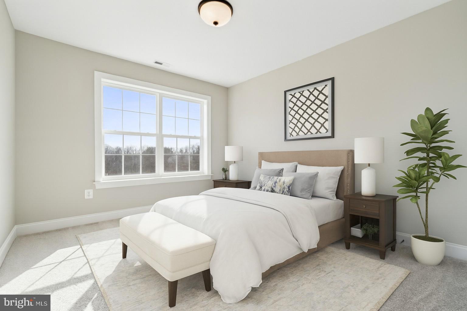 2204 Arden Drive Fallston, MD 21047 - Photo 23 of 32 a bedroom with a bed and a potted plant
