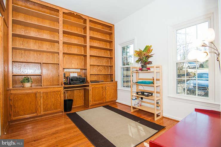 7801 Cliffside Court Springfield, VA 22153 - Photo 14 of 30 a kitchen with stainless steel appliances granite countertop a refrigerator and a sink