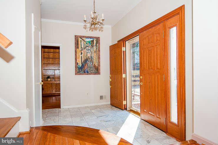 7801 Cliffside Court Springfield, VA 22153 - Photo 3 of 30 a view of an entryway with front door