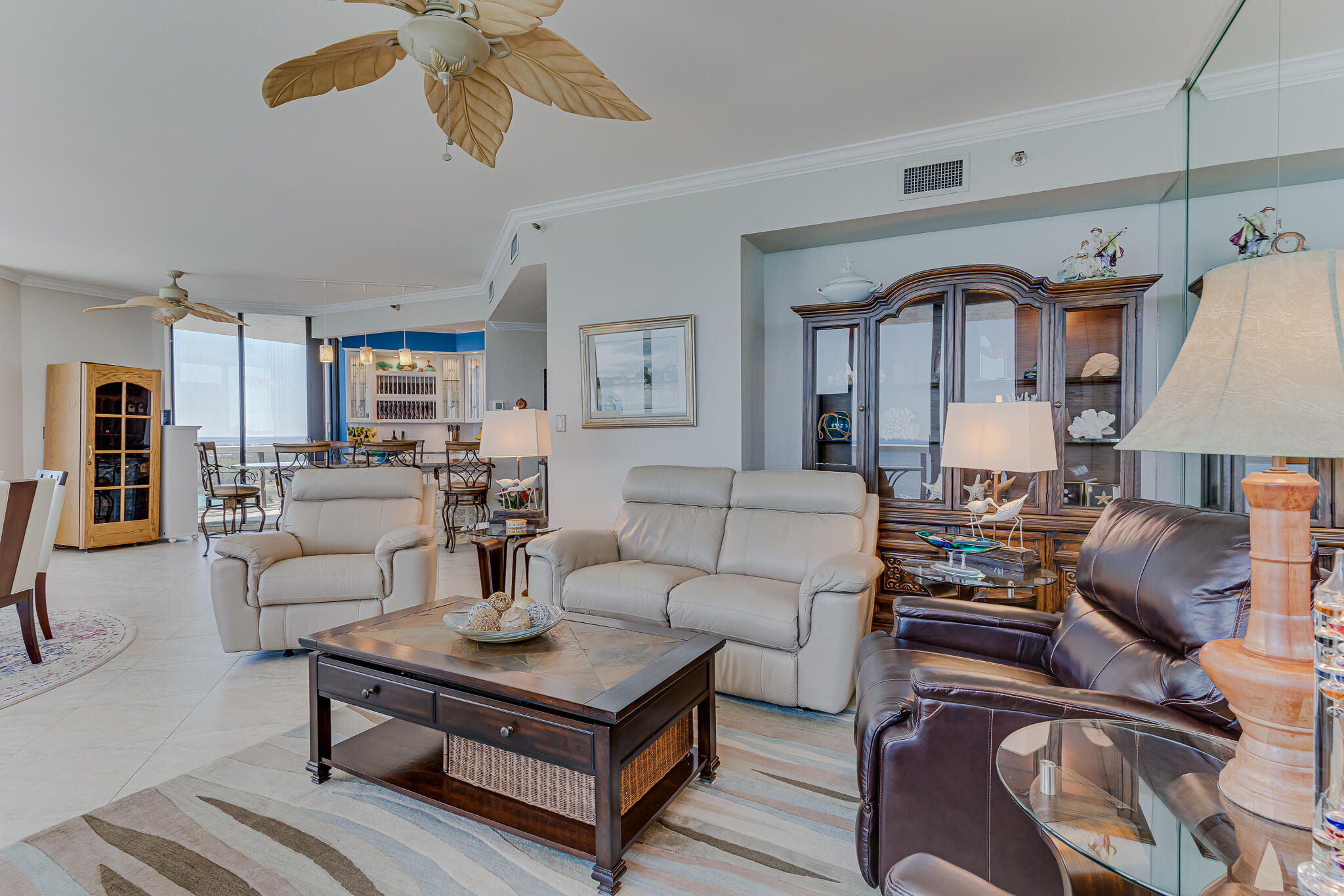 1096 Scenic Gulf Drive, Unit PH 1602 Miramar Beach, FL 32550 - Photo 17 of 80 a living room with furniture and a chandelier