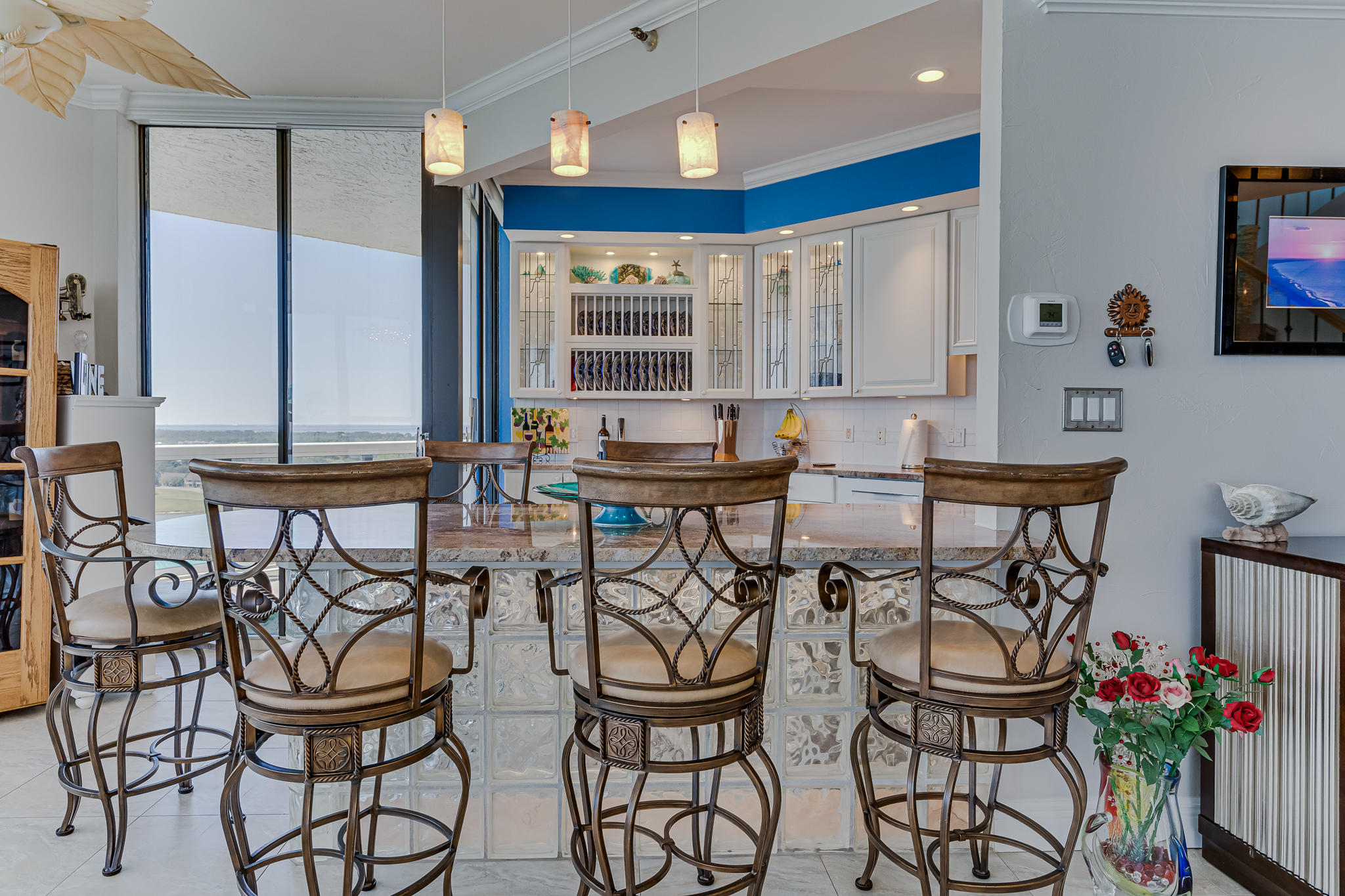 1096 Scenic Gulf Drive, Unit PH 1602 Miramar Beach, FL 32550 - Photo 18 of 80 a view of a chairs and table in a room