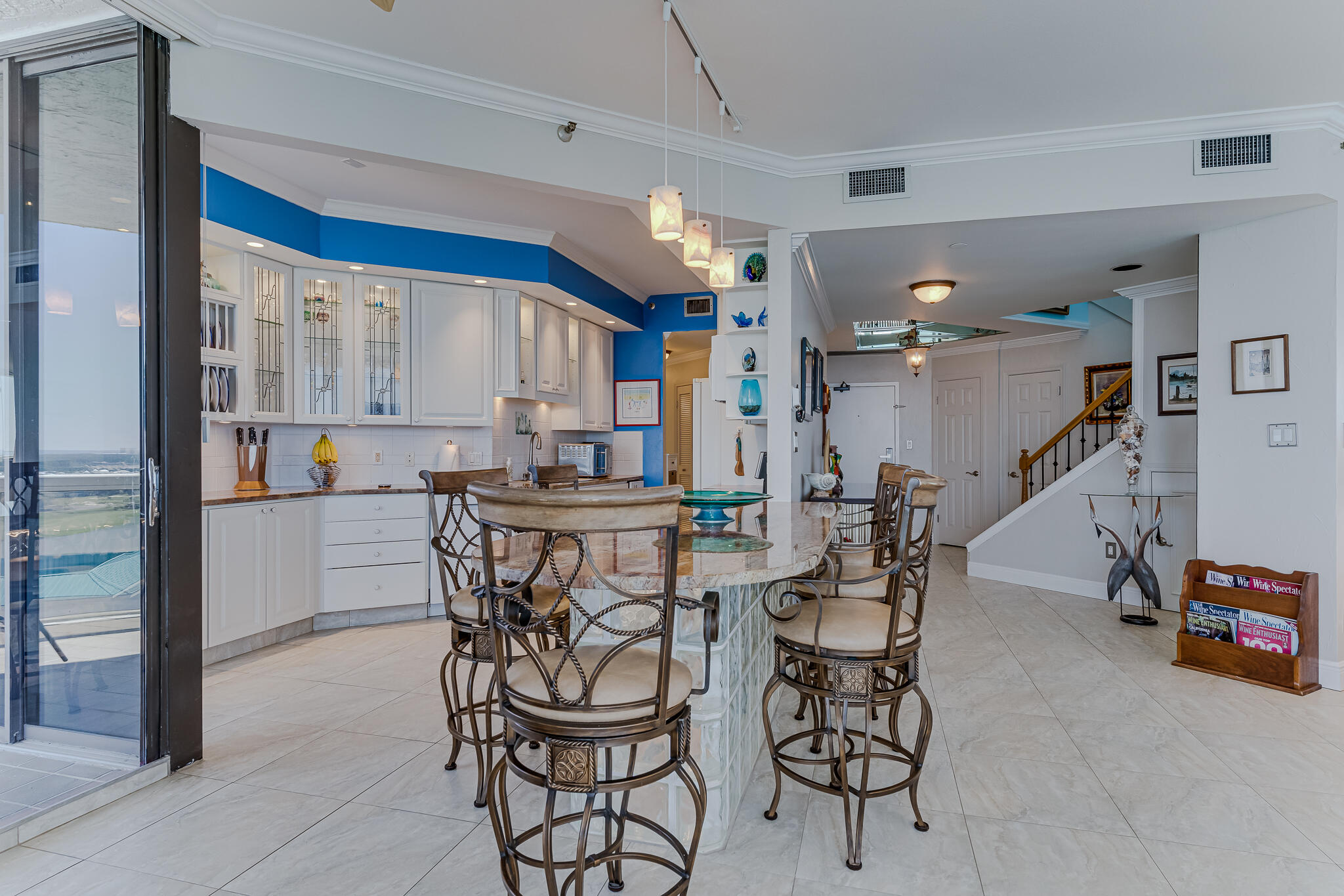 1096 Scenic Gulf Drive, Unit PH 1602 Miramar Beach, FL 32550 - Photo 20 of 80 a dining area with furniture and kitchen view