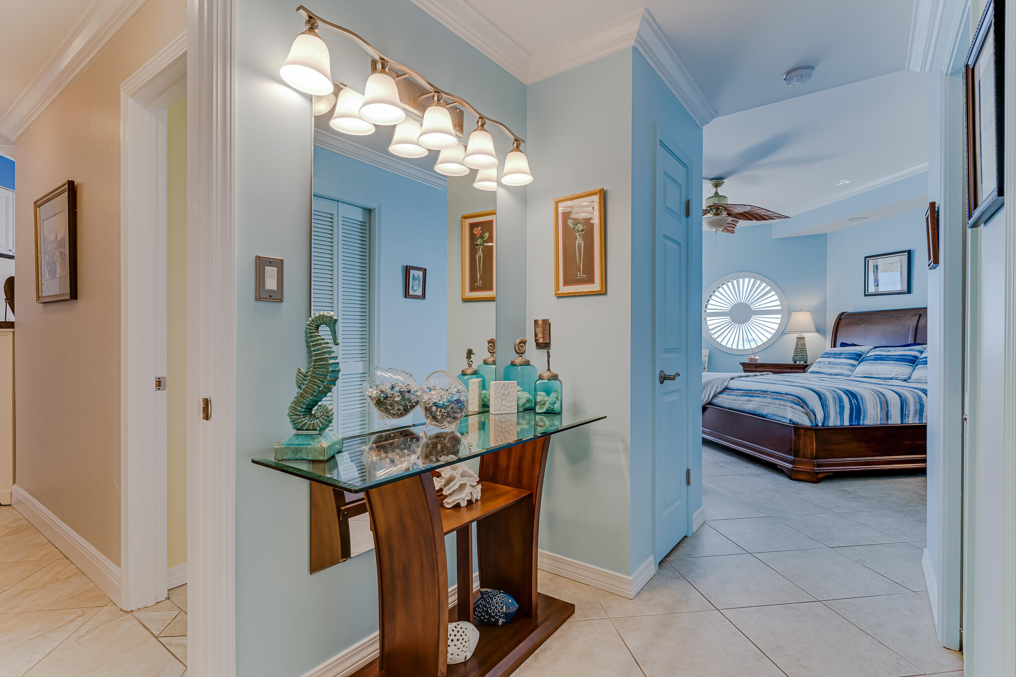 1096 Scenic Gulf Drive, Unit PH 1602 Miramar Beach, FL 32550 - Photo 28 of 80 a bedroom with furniture and a chandelier