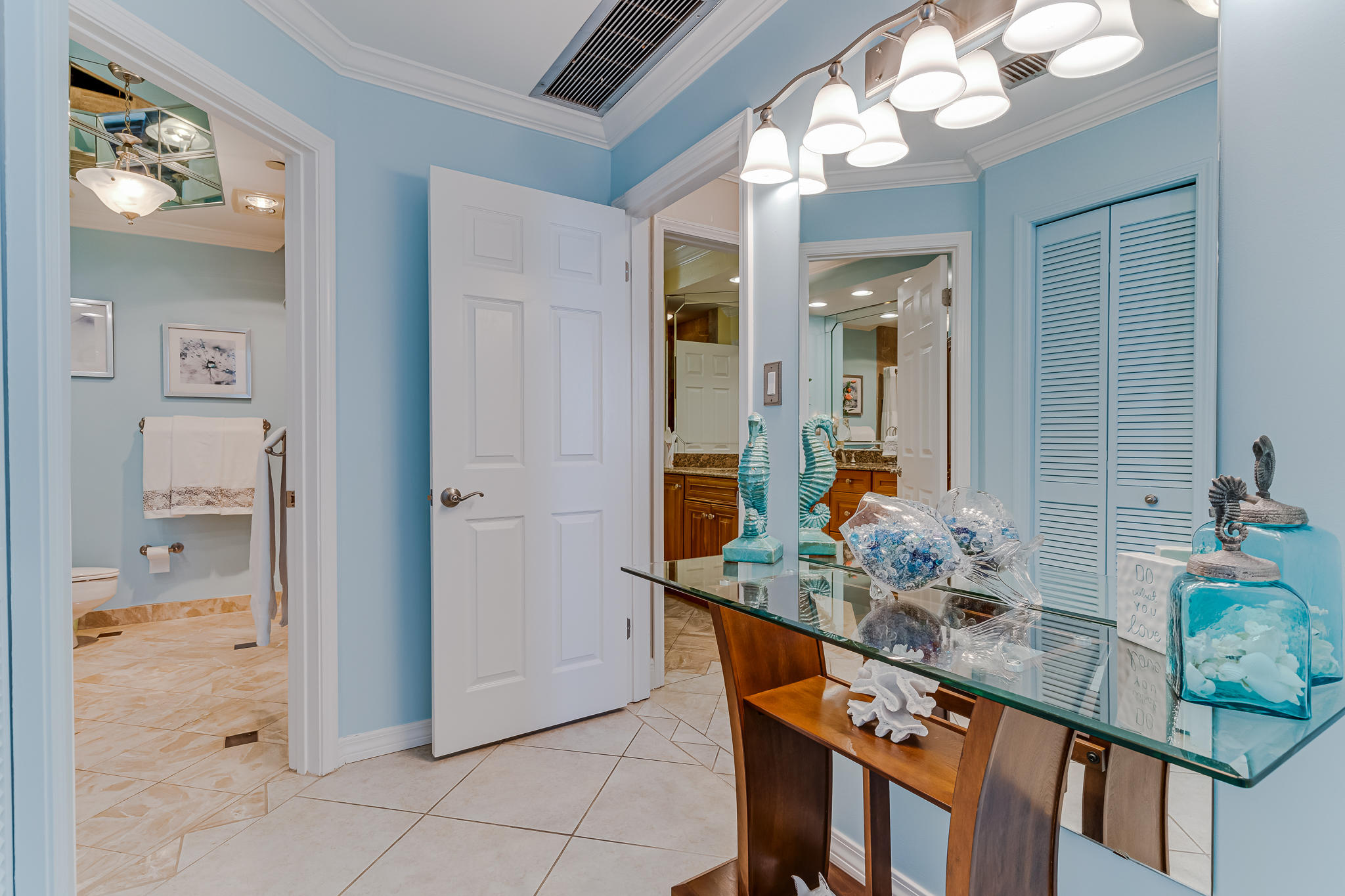 1096 Scenic Gulf Drive, Unit PH 1602 Miramar Beach, FL 32550 - Photo 34 of 80 a bathroom with a granite countertop sink and a mirror