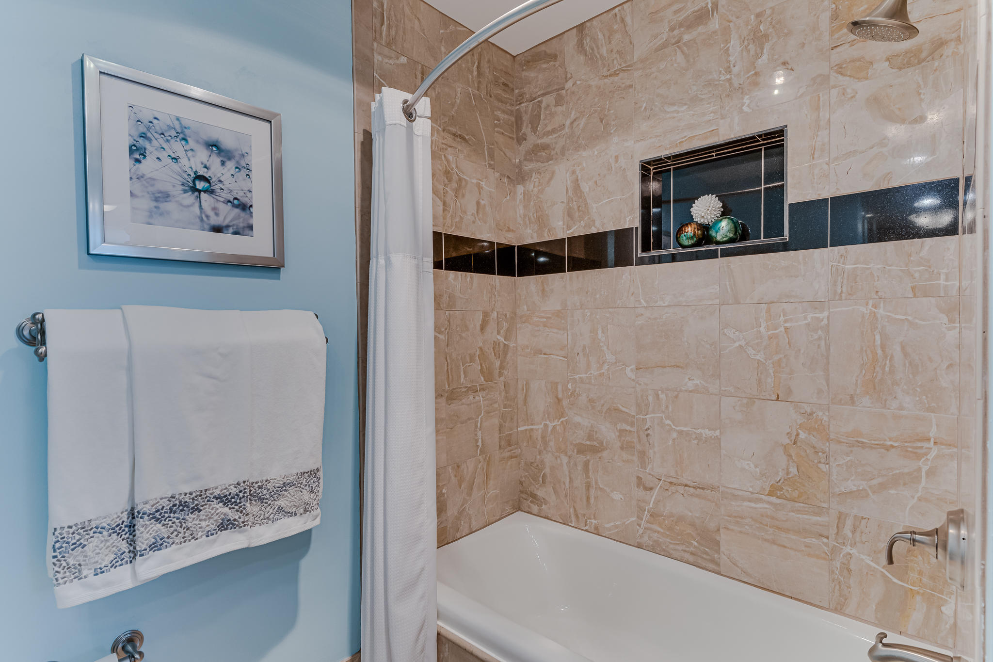 1096 Scenic Gulf Drive, Unit PH 1602 Miramar Beach, FL 32550 - Photo 36 of 80 a bathroom with a bathtub and a shower