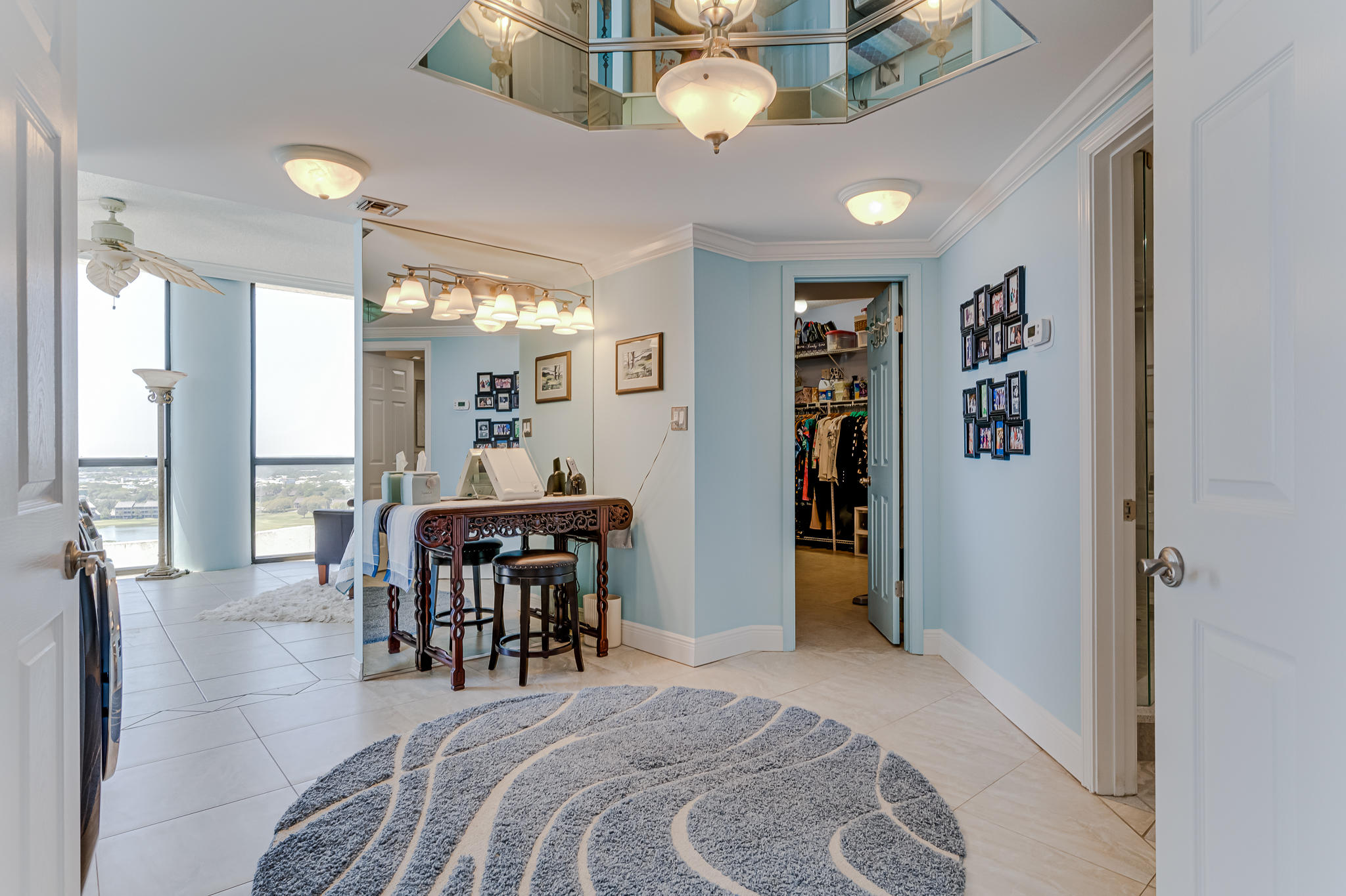 1096 Scenic Gulf Drive, Unit PH 1602 Miramar Beach, FL 32550 - Photo 46 of 80 a bedroom with furniture and a large window