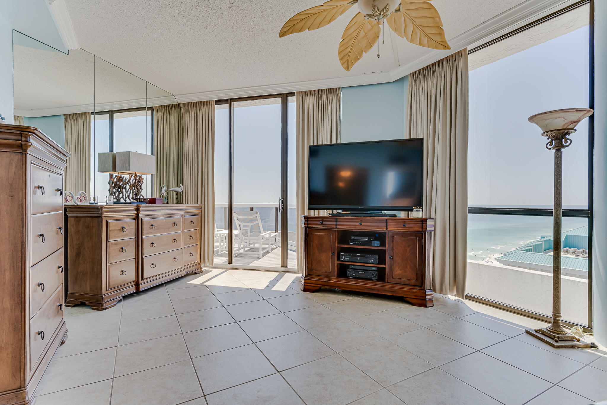 1096 Scenic Gulf Drive, Unit PH 1602 Miramar Beach, FL 32550 - Photo 49 of 80 a living room with furniture and flat screen tv