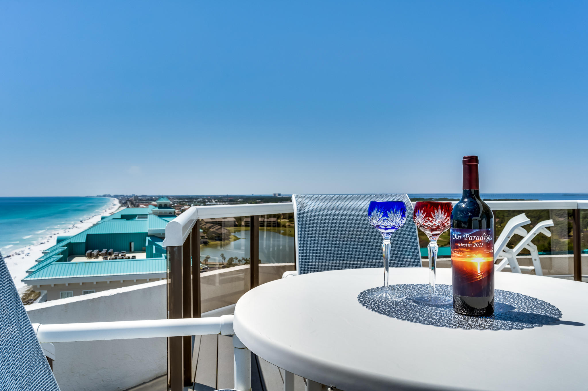 1096 Scenic Gulf Drive, Unit PH 1602 Miramar Beach, FL 32550 - Photo 51 of 80 a kitchen with a table and chairs