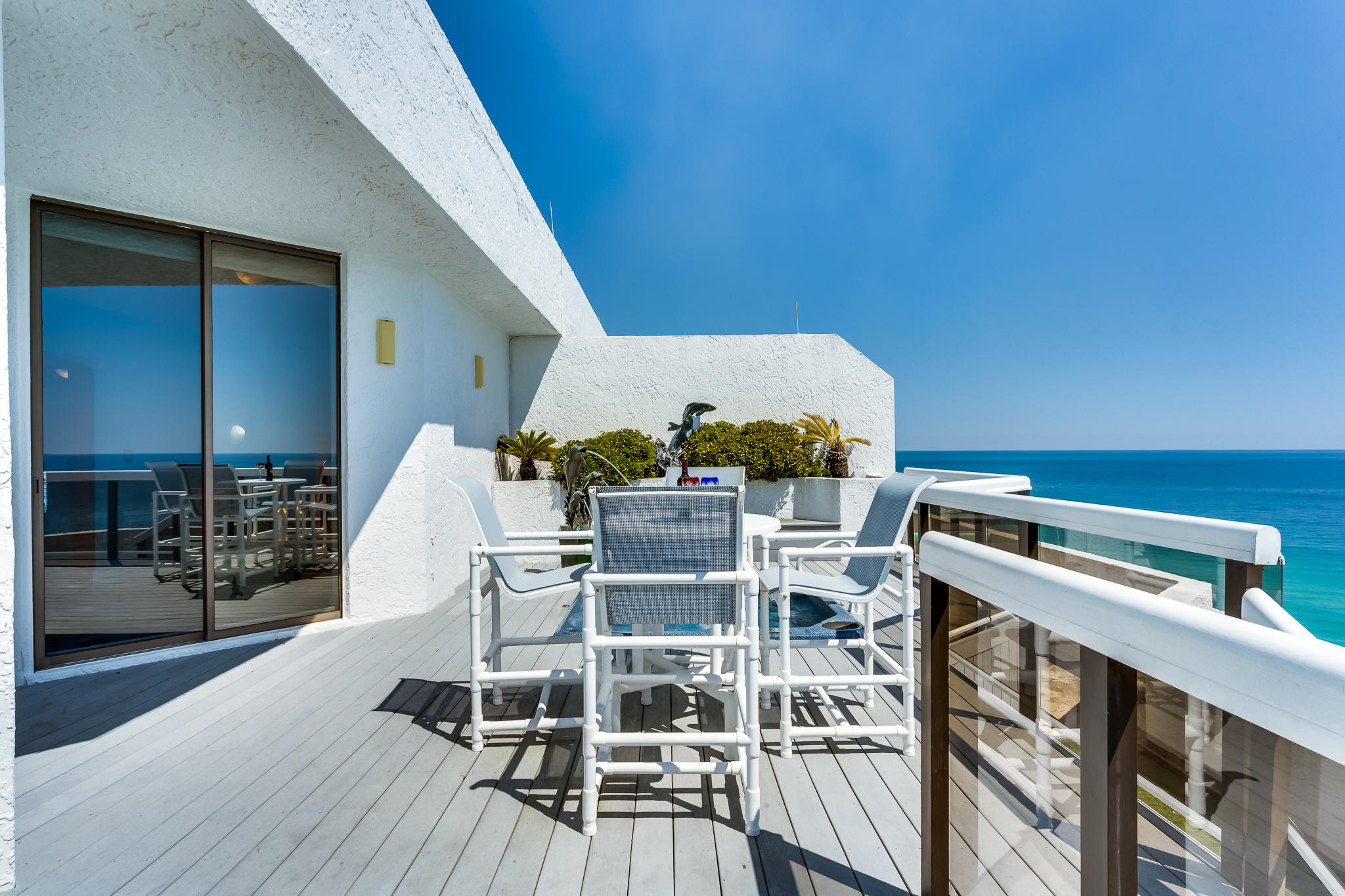 1096 Scenic Gulf Drive, Unit PH 1602 Miramar Beach, FL 32550 - Photo 56 of 80 a view of a balcony with chairs