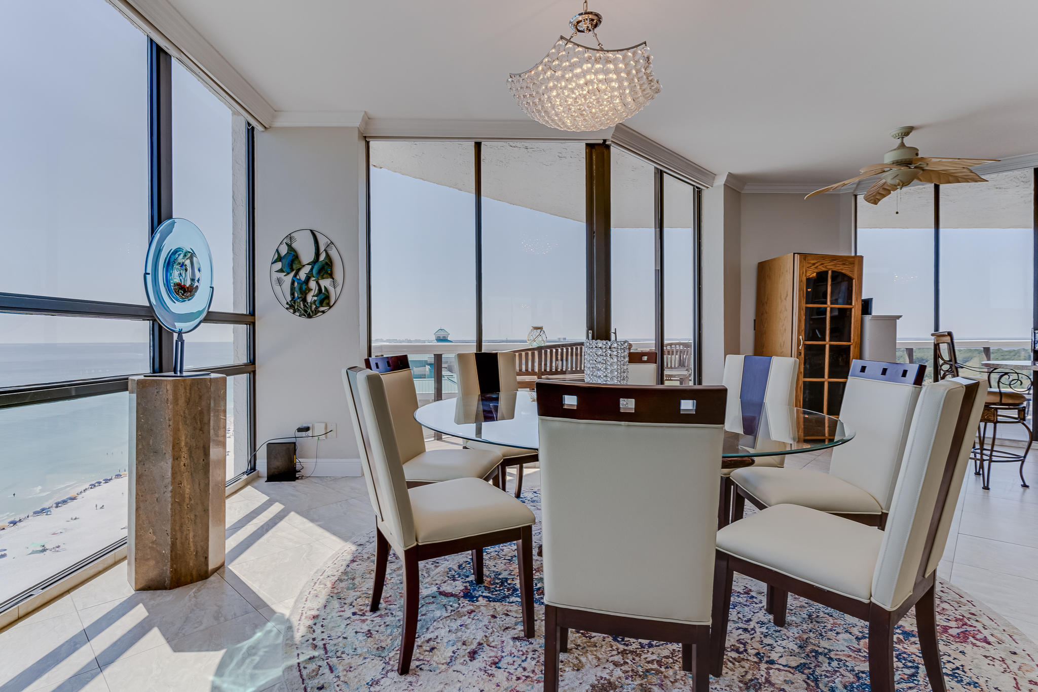 1096 Scenic Gulf Drive, Unit PH 1602 Miramar Beach, FL 32550 - Photo 10 of 80 a dining room with furniture and wooden floor