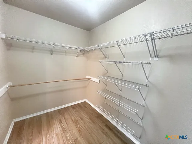 a view of a room with racks on the wall