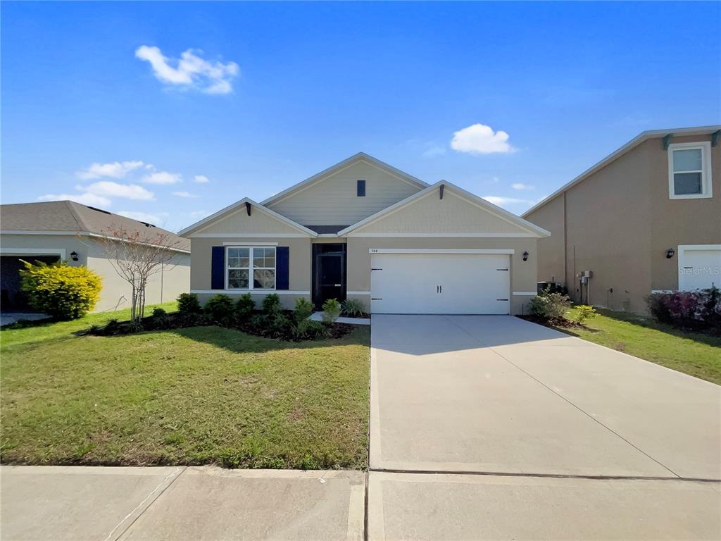 944 Brooklet Drive Davenport, FL 33837 - Photo 1 of 1 a front view of a house with a yard