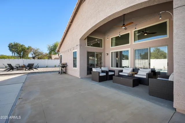 a view of a walk in closet and a window