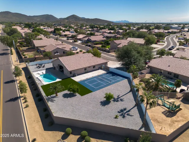 an aerial view of a house with a garden